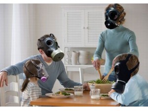 Image of family wearing gas masks